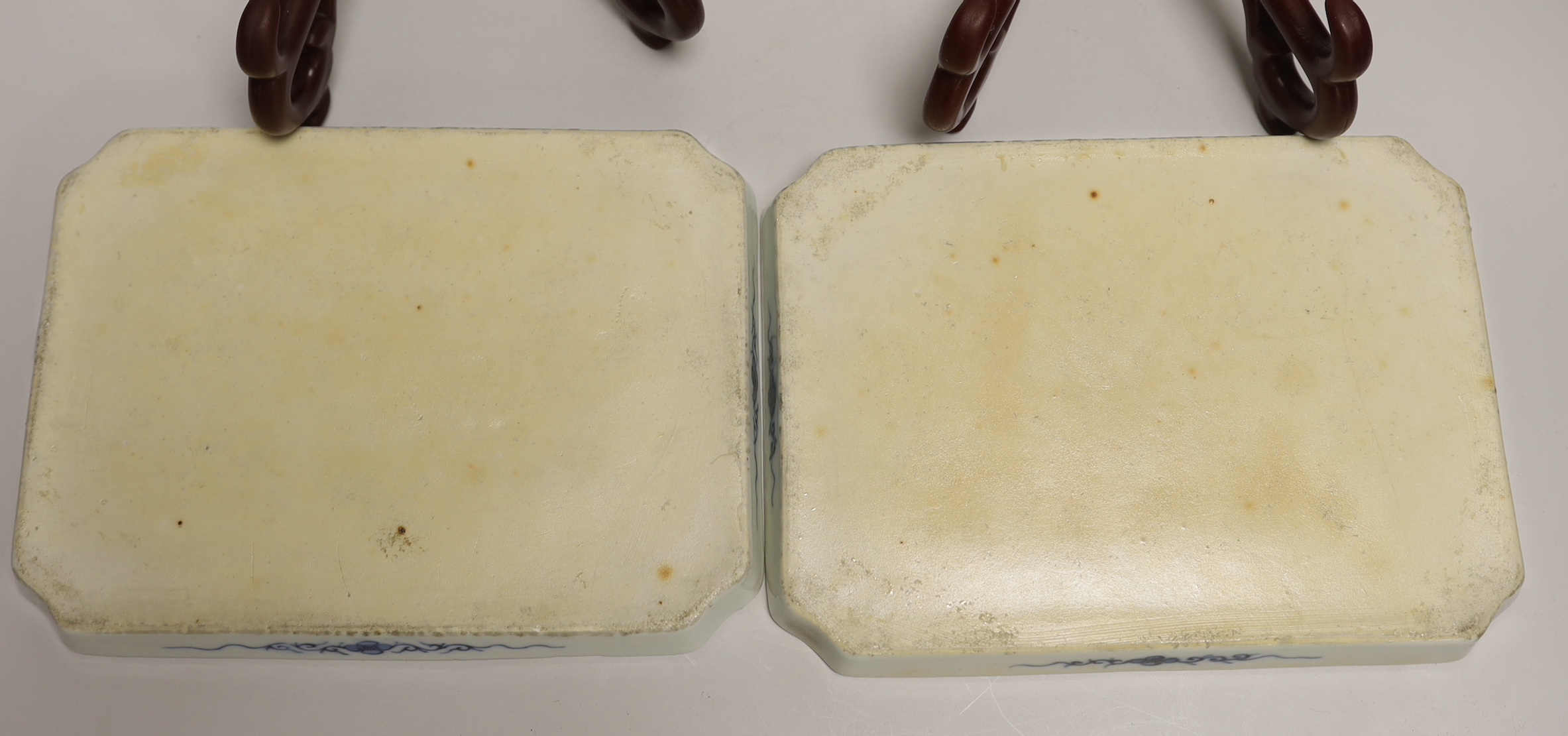 A pair of 19th century Chinese blue and white ‘Seven Sages of the bamboo grove’ dishes, 23.5cm long